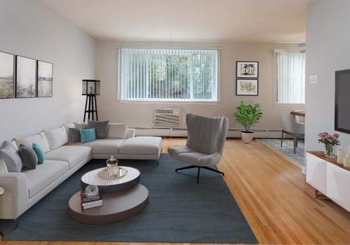 客厅有沙发，椅子和电视在Eola公园bbin出租在费城，宾夕法尼亚州